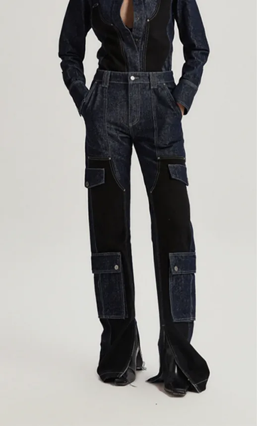 Dark-rinse cargo jeans with black panels and a split hem